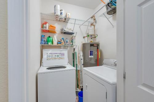 a small laundry room with a washer and dryer at Pool Access, Private Patio and Grill Mesa Condo! in Mesa