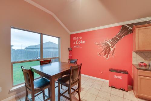 a kitchen with a dining room table and chairs at Temple Retreat Game Room and Deck, Pets Welcome in Temple