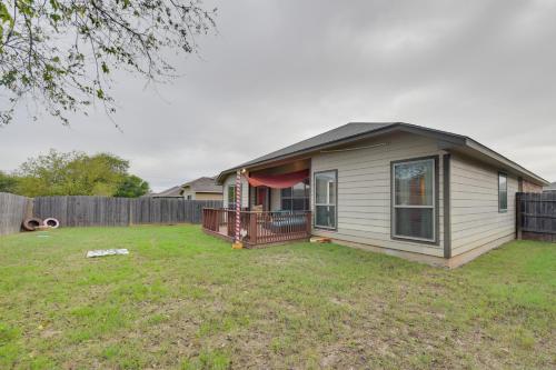 a small house with a deck in a yard at Temple Retreat Game Room and Deck, Pets Welcome in Temple