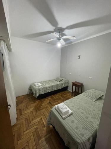 Ένα ή περισσότερα κρεβάτια σε δωμάτιο στο Hotel C&R