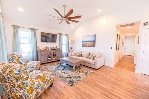 a living room with a couch and a table at 8430 - It Was All A Dream in Avon