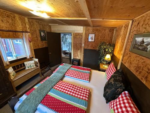 Postel nebo postele na pokoji v ubytování The Cabin