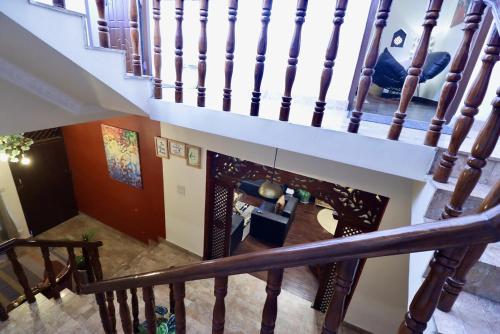 an overhead view of a living room with a fireplace at Wanderer's Home Dhumbarahi in Kathmandu