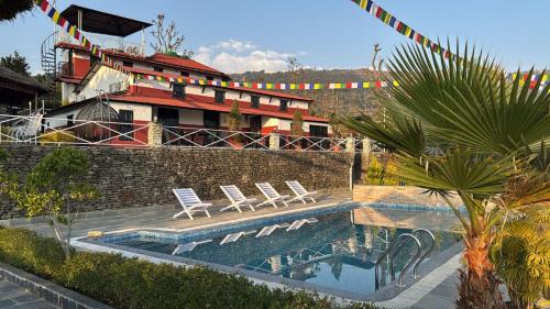 Bazén v ubytování Annapurna Forest Resort nebo v jeho okolí