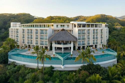 an aerial view of a resort with a swimming pool at Delta Hotels by Marriott Riviera Nayarit, an All-Inclusive Resort in Cruz de Huanacaxtle