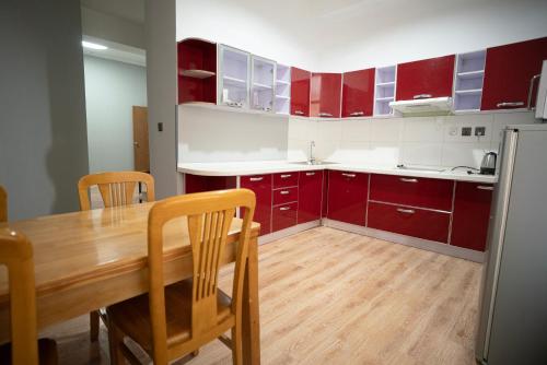 Kuchyň nebo kuchyňský kout v ubytování Tsolmon's Serviced Apartments