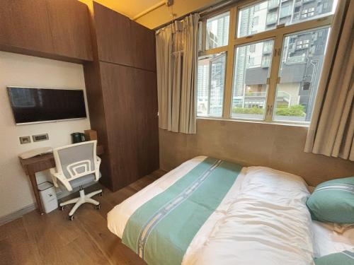 Cama o camas de una habitación en 王子公館King's mansion