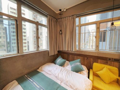 Postel nebo postele na pokoji v ubytování JST Hotel