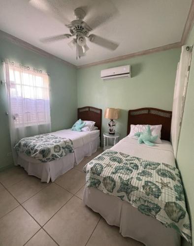 Postelja oz. postelje v sobi nastanitve Turtles Hideaway