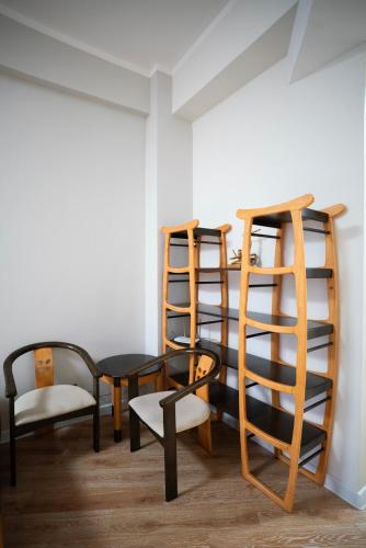Palanda nebo palandy na pokoji v ubytování Tsolmon's Serviced Apartments