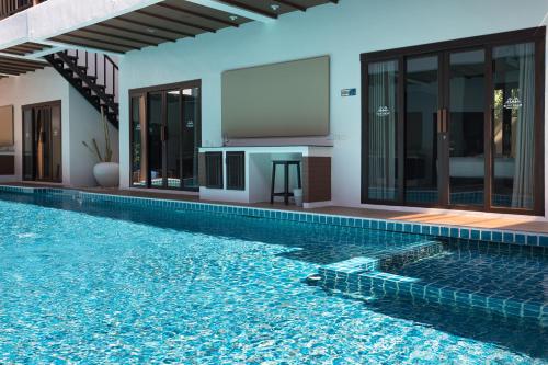 Πισίνα στο ή κοντά στο Blue Palm Residence Kata