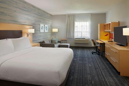 Ένα ή περισσότερα κρεβάτια σε δωμάτιο στο TownePlace Suites by Marriott London