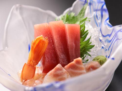 a bunch of watermelon and carrots in a blender at Seaside Hotel Kujukuri in Sammu