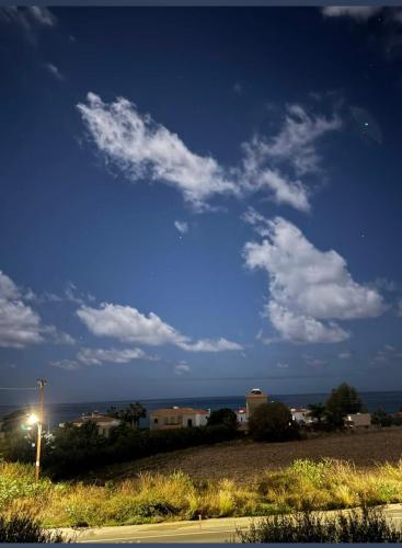 a street with a street light on the side of a road at Blue Seaview Appartments in Paphos City