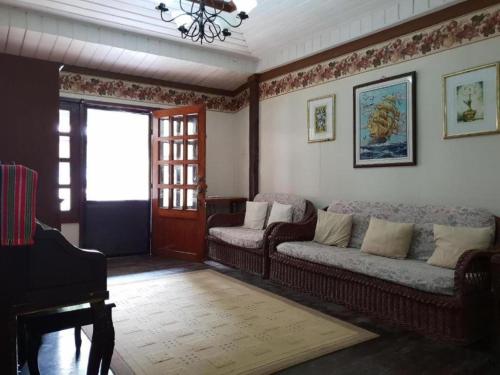 Część wypoczynkowa w obiekcie UrbanView BNKY Bed and Breakfast Palawan by RedDoorz