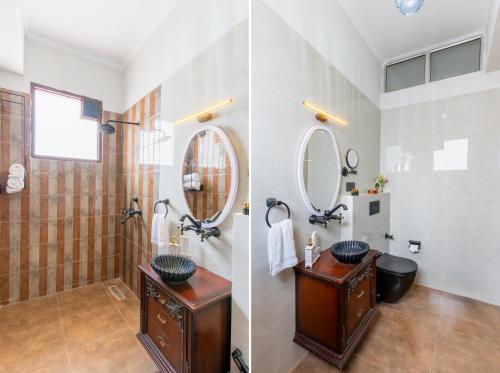 a bathroom with a sink and a mirror at Seclude Tea Estate, Palampur in Pālampur