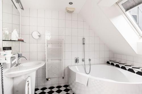 Vannituba majutusasutuses Tailormade Hotel KRONE Sarnen