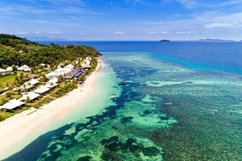 an aerial view of a beach and the ocean at Sheraton Resort & Spa, Tokoriki Island, Fiji in Tokoriki