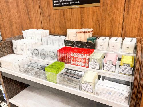 a store shelf filled with lots of different types of soap at APA Hotel Tokyo Nishikasai Ekimae in Tokyo