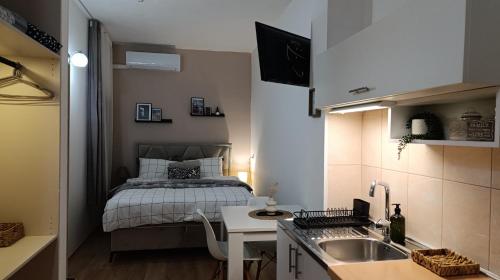 Dapur atau dapur kecil di Apartment Mana