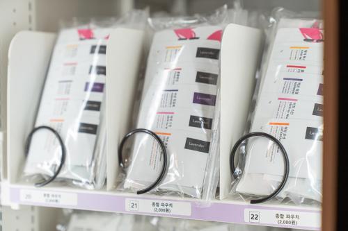 a pair of glasses sitting on a shelf at Cheonan H-Avenue Cheonan Buldang in Cheonan