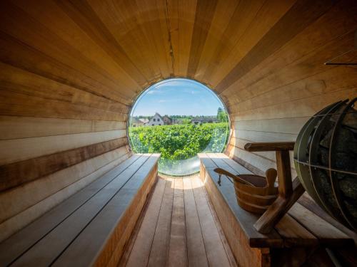 an inside of a sauna with a window at James Vignoble Hôtel, Eguisheim in Eguisheim