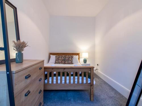 Katil atau katil-katil dalam bilik di Pass the Keys Modern Lovely Flat in St Johns Chapel
