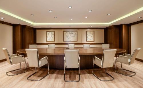a conference room with a large table and chairs at Hotel Don Pepe Gran Meliá in Marbella
