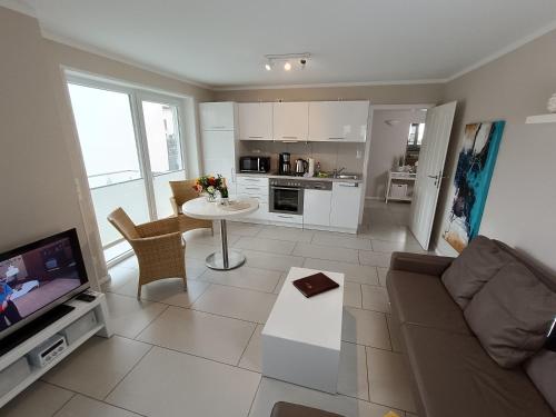 Η κουζίνα ή μικρή κουζίνα στο Haus Nemo - Appartement 5, Gemütliches Appartement mit Strandkorb, strandnah 50 m