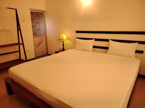 Cama o camas de una habitación en Flying Peacock Yala, Katharagama,