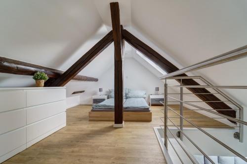 Katil atau katil-katil dalam bilik di Sonnenappartement Saarlouis