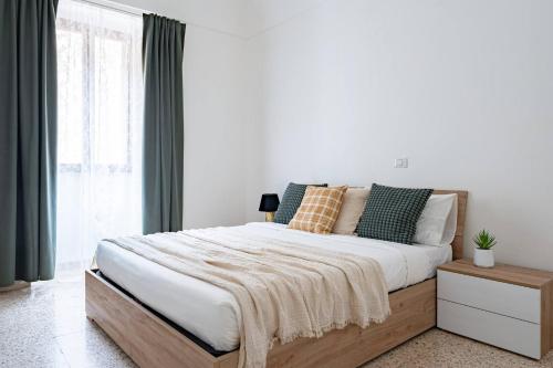 Ένα ή περισσότερα κρεβάτια σε δωμάτιο στο La casa di FeliGiò - YourPlace Abruzzo