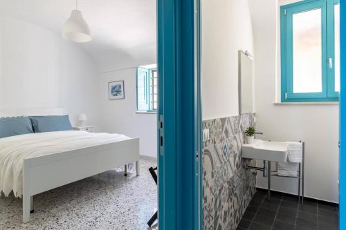 Ένα ή περισσότερα κρεβάτια σε δωμάτιο στο La casa di Maria - YourPlace Abruzzo