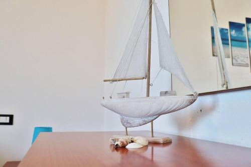 a model boat sitting on top of a table at Gianna's House - YourPlace Abruzzo in Ortona