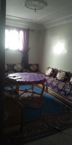 Ένα ή περισσότερα κρεβάτια σε δωμάτιο στο Agadir apartment