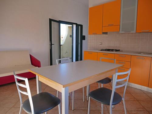 Η κουζίνα ή μικρή κουζίνα στο Residence fiorito spiaggia 300m by PortoOttioluAffitti