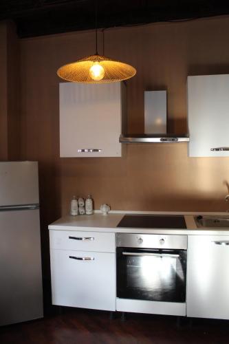 Floriads Apartments Caramelにあるキッチンまたは簡易キッチン