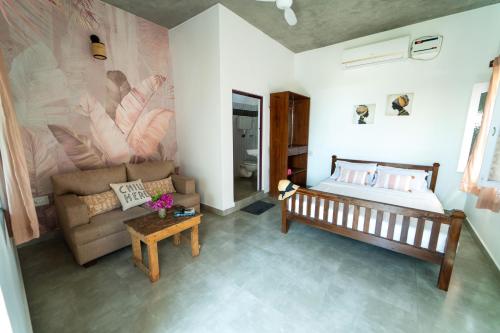 Katil atau katil-katil dalam bilik di Villa Amarena - Family friendly - Beach access