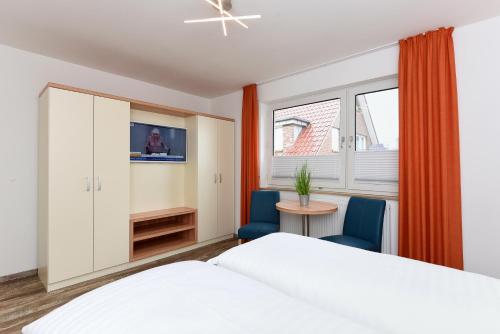 Cama o camas de una habitación en Zur Möwe 2