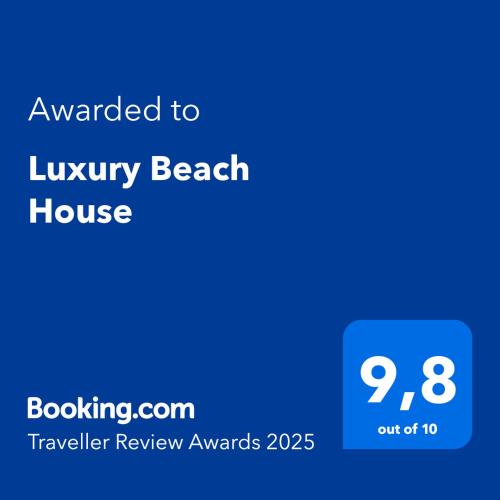 a screenshot of a phone with the text awarded to luxury beach house at Luxury Beach House in Torvaianica