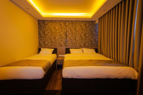 Кровать или кровати в номере Huzur Apart Hotel