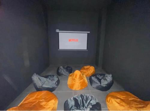 a room with four plastic bags on the floor at 10 Studio Charenton Chambre Fitness Cinema in Charenton-le-Pont