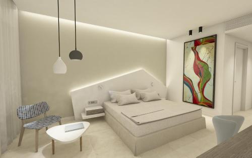 Kassandra Bay Resort, Suites & Spaにあるベッド