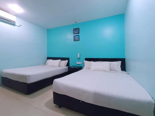 Una cama o camas en una habitación de Marjan Hotel by RVH