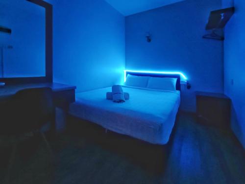 Una cama o camas en una habitación de Marjan Hotel by RVH