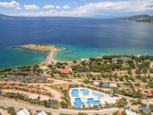 an aerial view of a beach and the ocean at Camping Klenovica in Klenovica