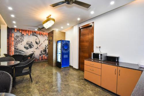 Kuchyň nebo kuchyňský kout v ubytování AH Grand Villa - Hotel Near Dalai Lama Temple