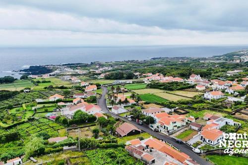 an aerial view of a small town with a road at Casa Martins by PontaNegraAzores in Biscoitos