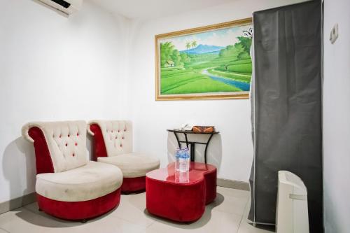 Ruang duduk di Townhouse Oak Ilir Timur I Near Ptc Mall