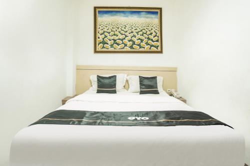 Katil atau katil-katil dalam bilik di Townhouse Oak Ilir Timur I Near Ptc Mall